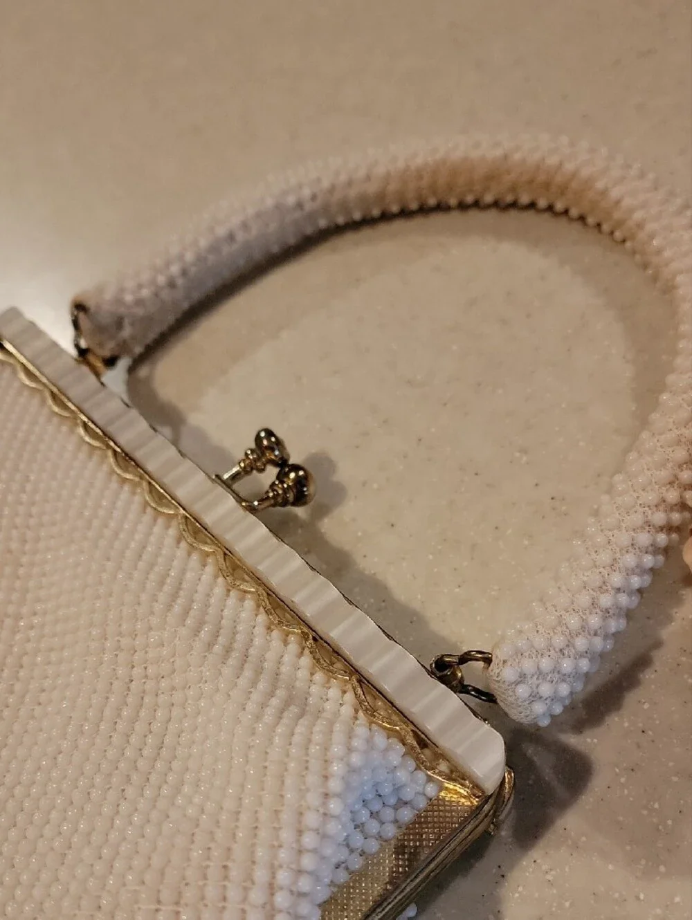 Elegant White Beaded Evening Clutch with Gold Accents